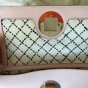 Kate Spade twist latch clutch
